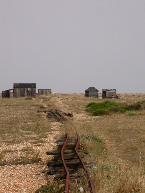DSCN2144.JPG - Sheds, boats and unknown constructions litter parts of the shingle sea. In this case, possibly old track for running boats to and from the water.